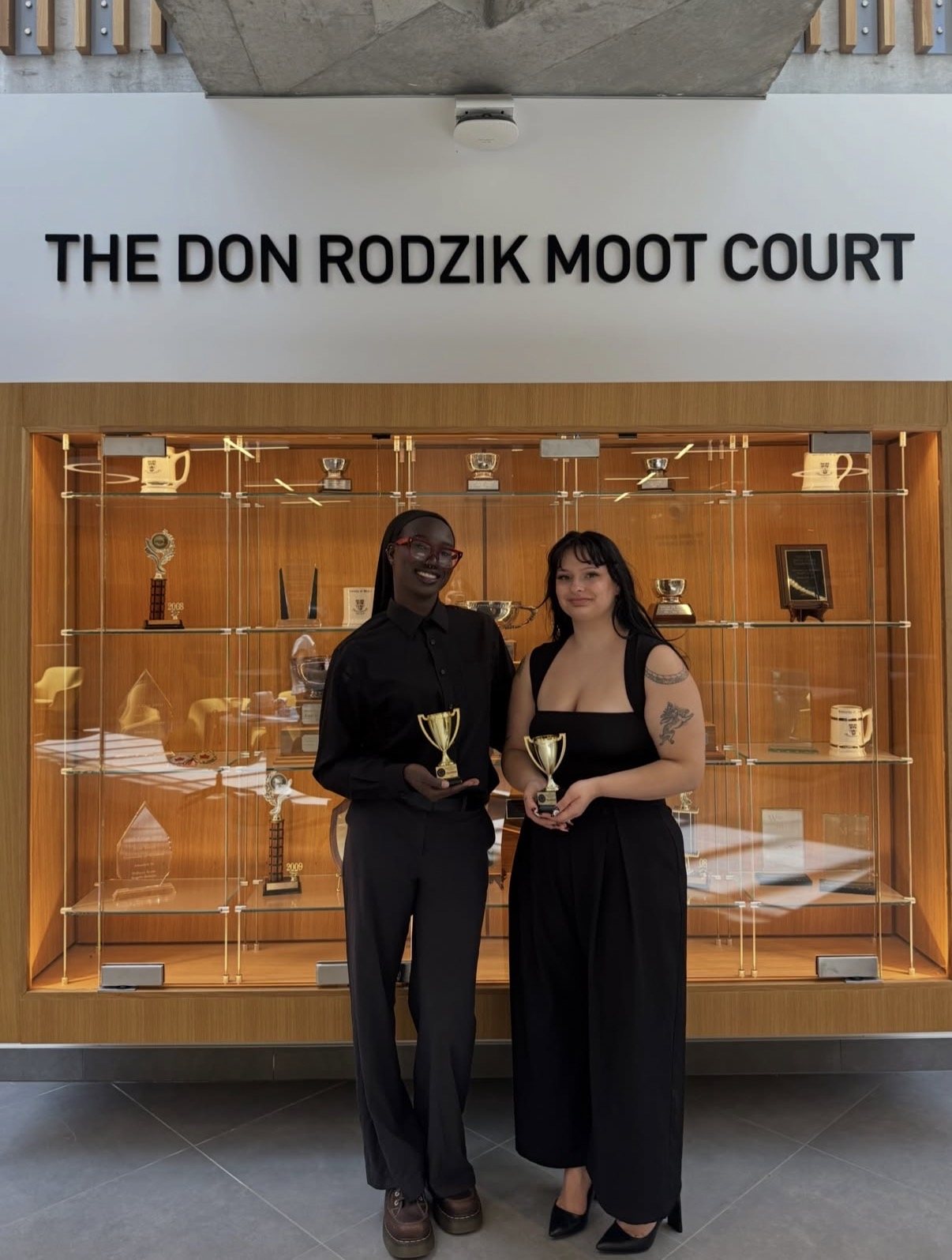 June Moot 2026 champions Grace Philemon and Nevaeh Miller with their trophies