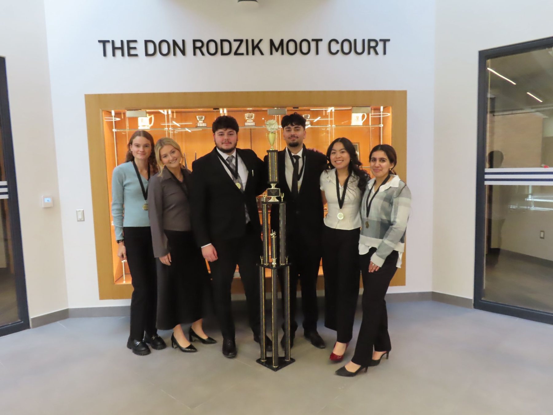 Winter Mock Trial 2026 champions with the trophy